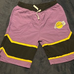 Boys Large Lakers shorts, purple, yellow and‎ black. Good condition.
